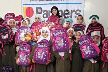 150 orphan girl students received school backpacks in Sana’a from Mona Relief